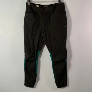 Oakley’s mens size 32 performance fit black athletic pants teal contrast back